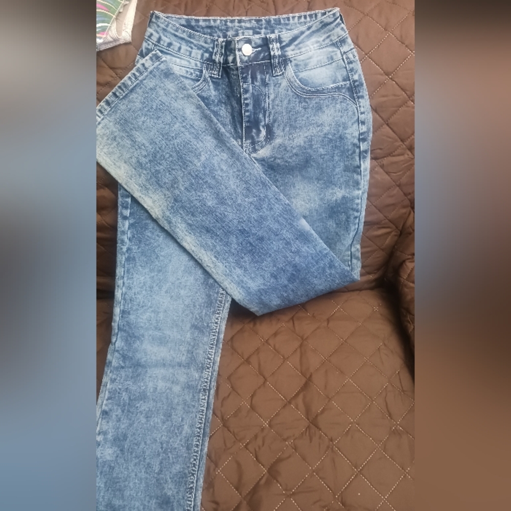 Light Blue Skinny Jeans with Vintage Wash and Textured Fabric
